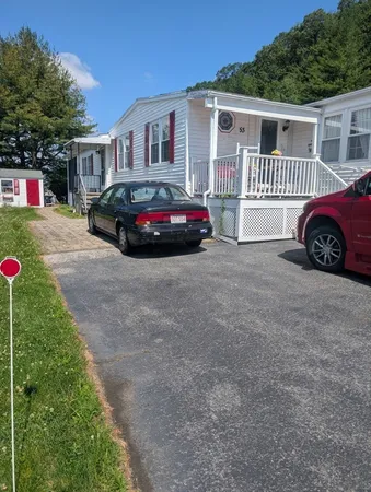 a car parked in front of a house