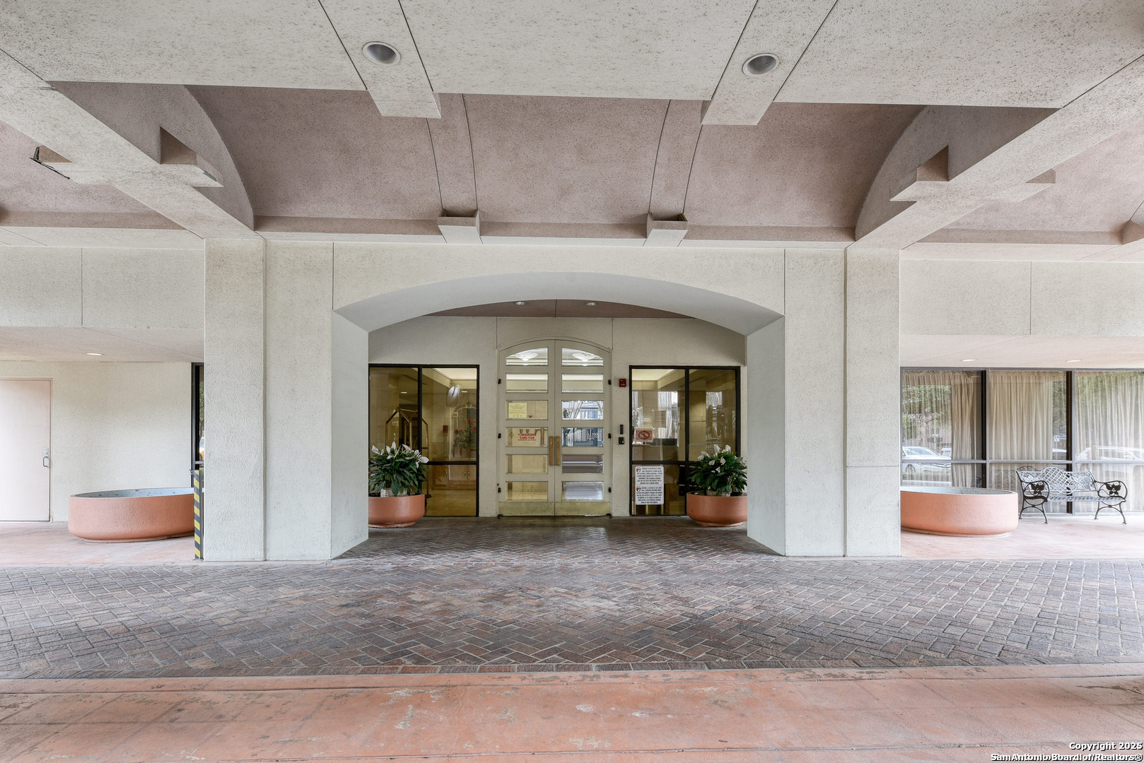 7701 Wurzbach Road, Unit 301 San Antonio, TX 78229 - Photo 3 of 42 an entryway view with a living room and bathroom