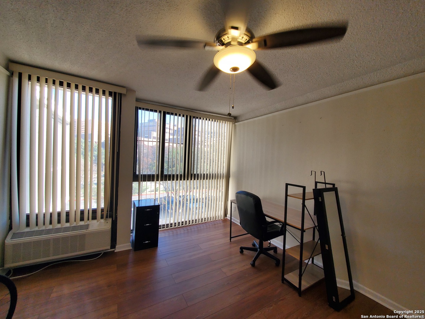 7701 Wurzbach Road, Unit 301 San Antonio, TX 78229 - Photo 37 of 42 a view of a workspace with furniture and a window