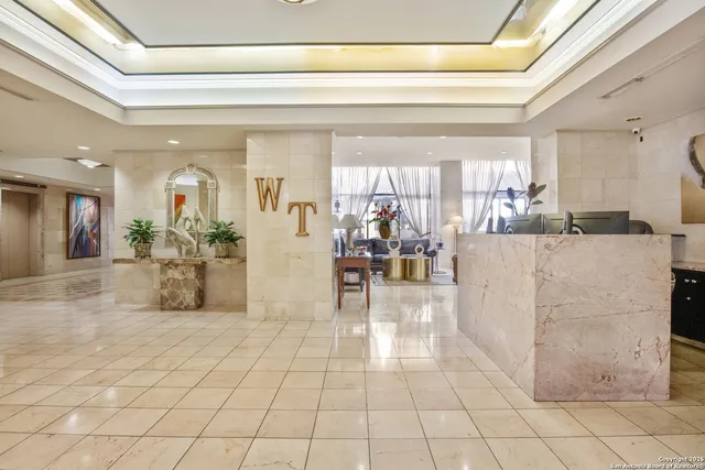 a view of a living room and entry way