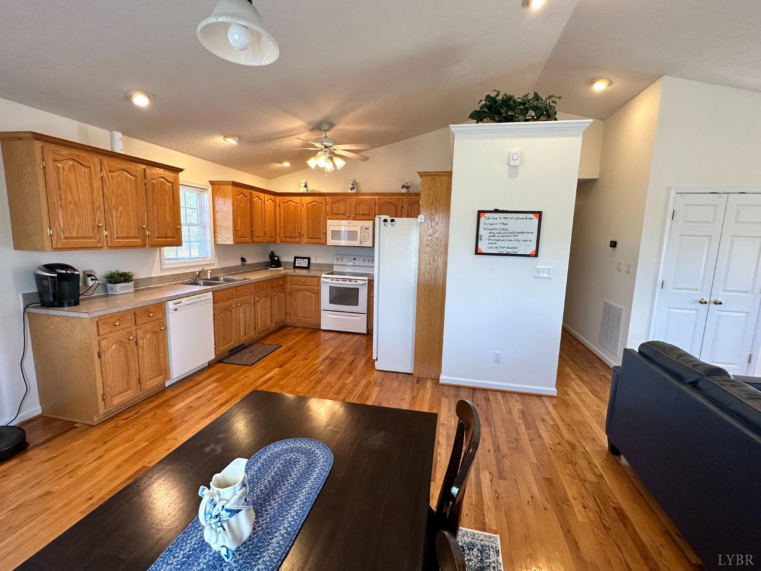137 Rhonda Road Rustburg, VA 24588 - Photo 11 of 50 a kitchen with stainless steel appliances granite countertop a refrigerator a stove top oven a sink and dishwasher