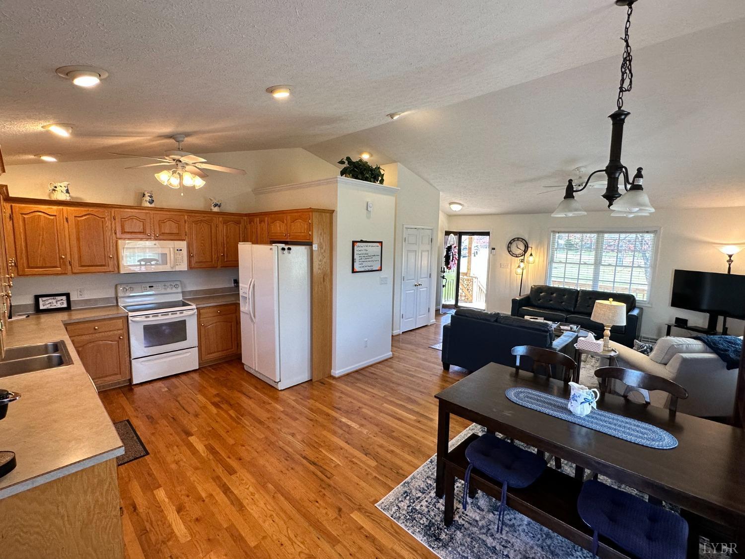 137 Rhonda Road Rustburg, VA 24588 - Photo 12 of 50 a living room with stainless steel appliances furniture and a kitchen view