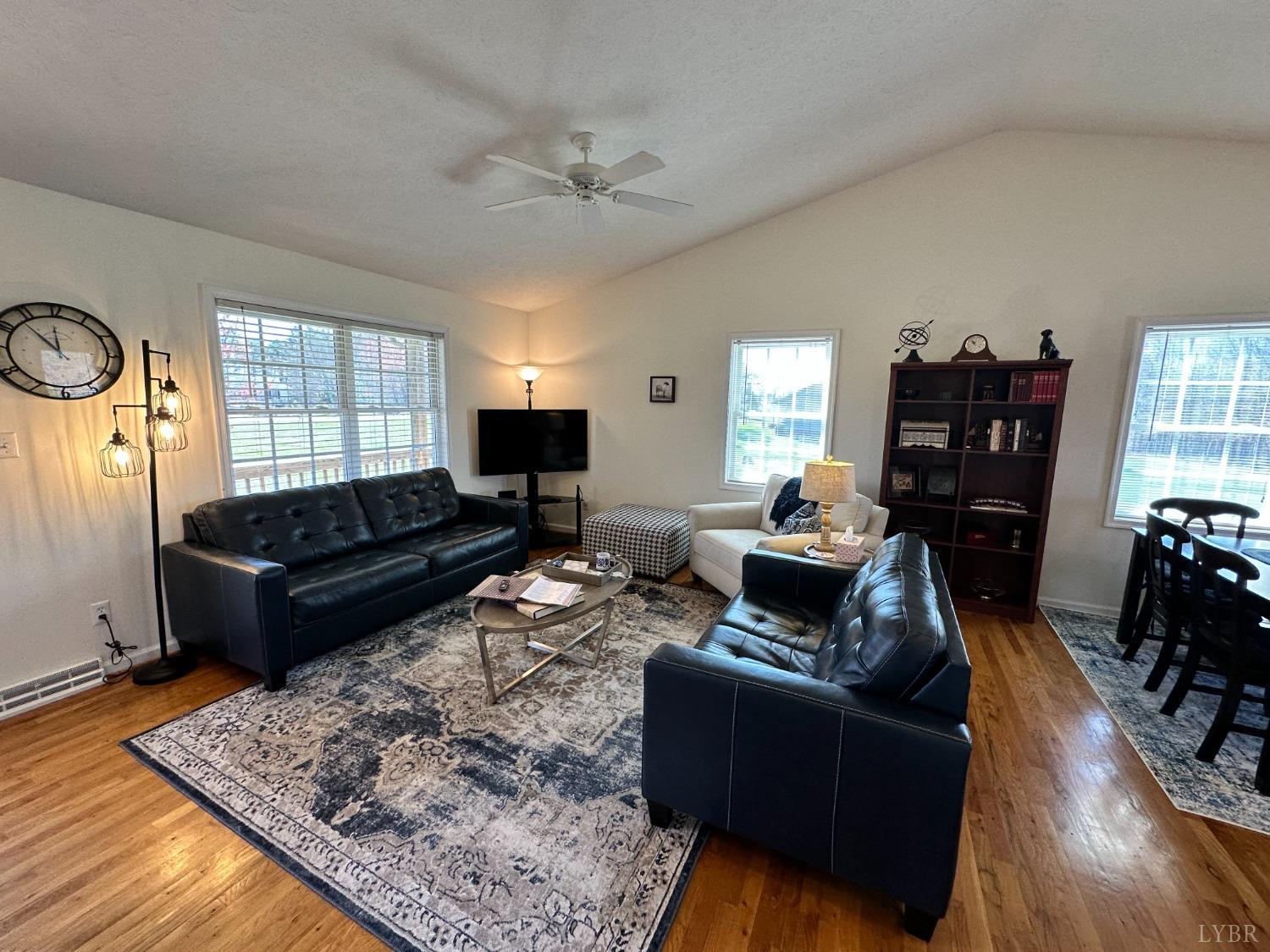 137 Rhonda Road Rustburg, VA 24588 - Photo 29 of 50 a living room with furniture and wooden floor