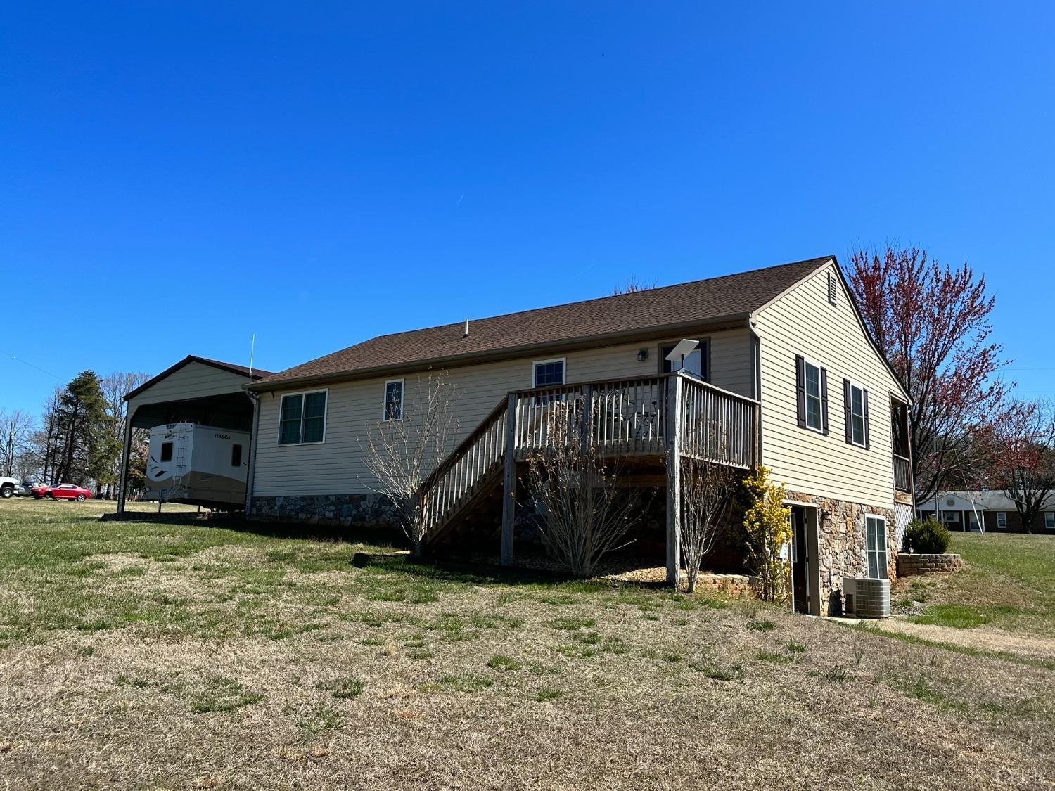 137 Rhonda Road Rustburg, VA 24588 - Photo 39 of 50 a view of a house with a yard
