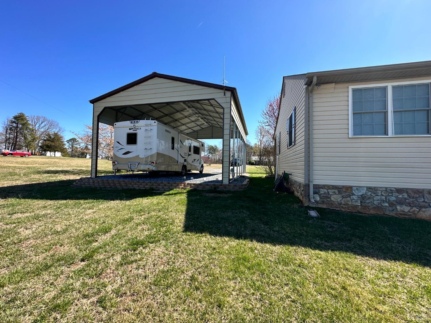 137 Rhonda Road Rustburg, VA 24588 - Photo 41 of 50 a view of a house with backyard and garden