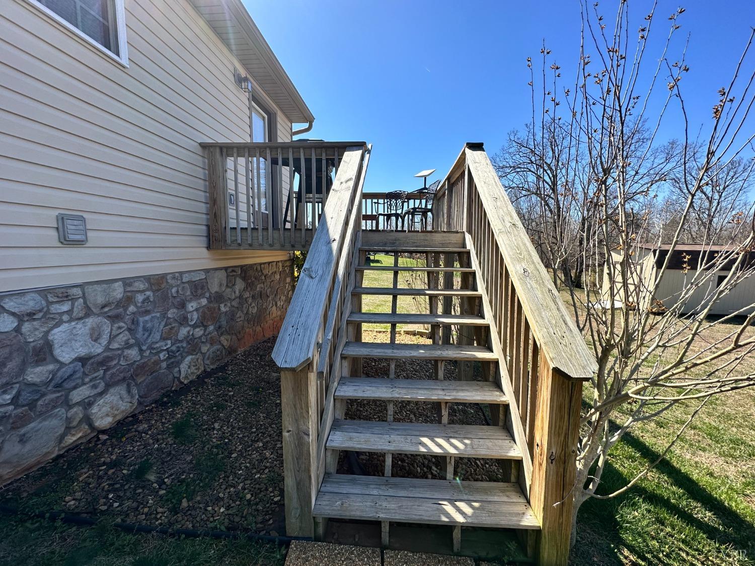 137 Rhonda Road Rustburg, VA 24588 - Photo 43 of 50 a view of staircase with wooden floor and a potted plant