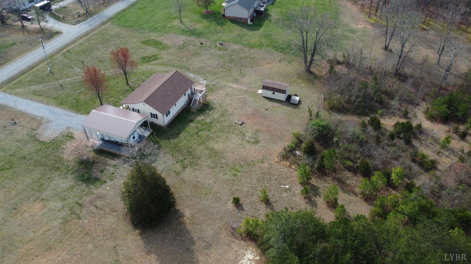 137 Rhonda Road Rustburg, VA 24588 - Photo 47 of 50 an aerial view of a house with a yard