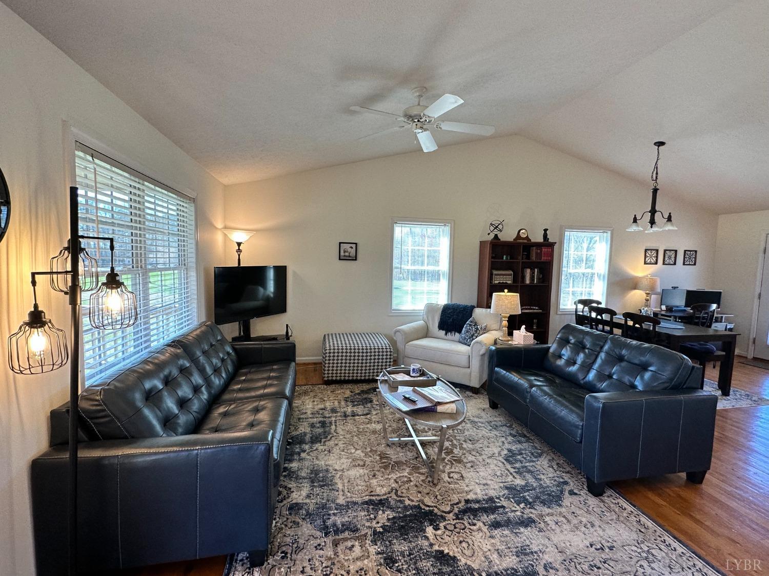 137 Rhonda Road Rustburg, VA 24588 - Photo 7 of 50 a living room with furniture and a flat screen tv