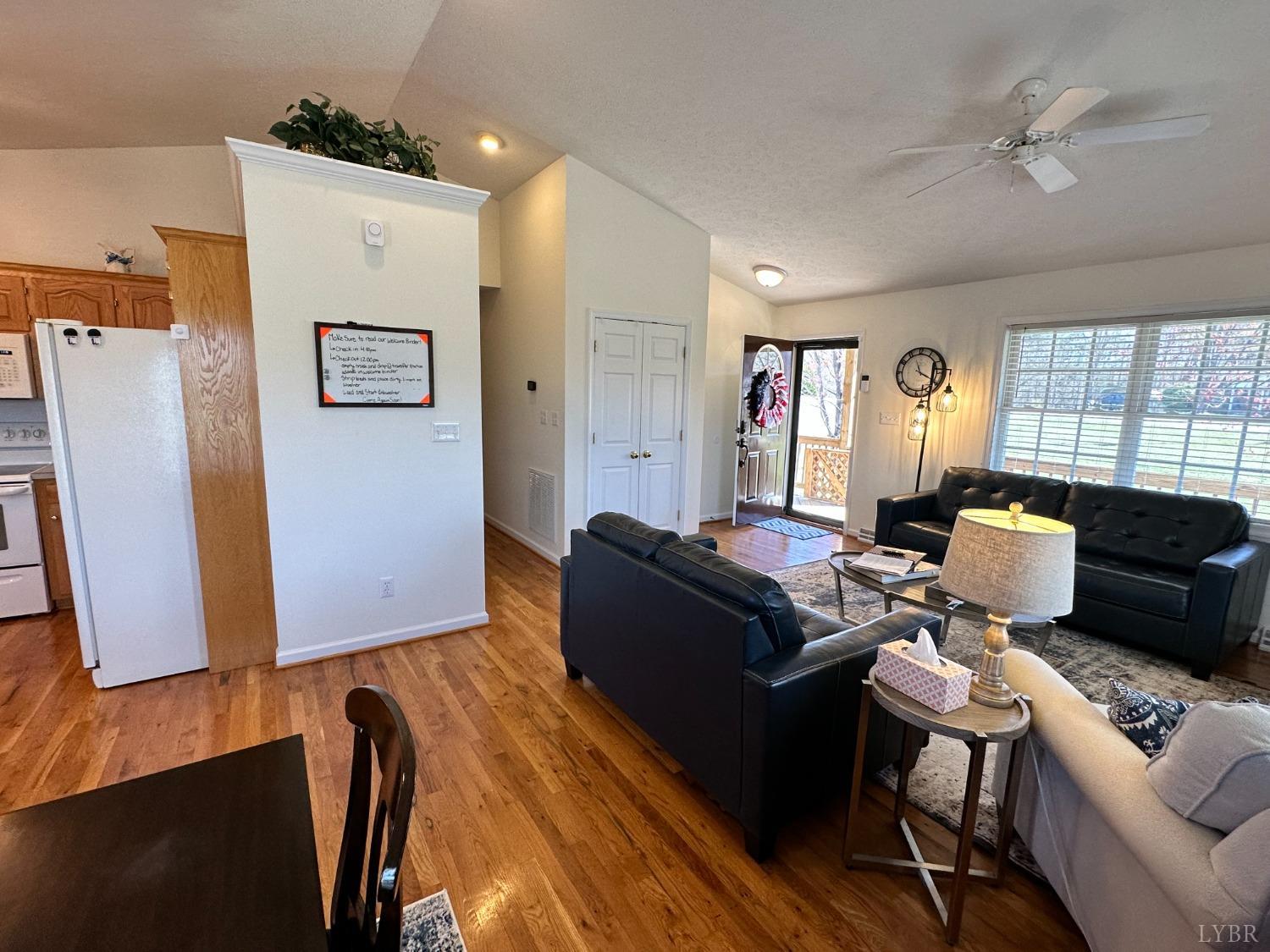 137 Rhonda Road Rustburg, VA 24588 - Photo 10 of 50 a living room with furniture and a flat screen tv