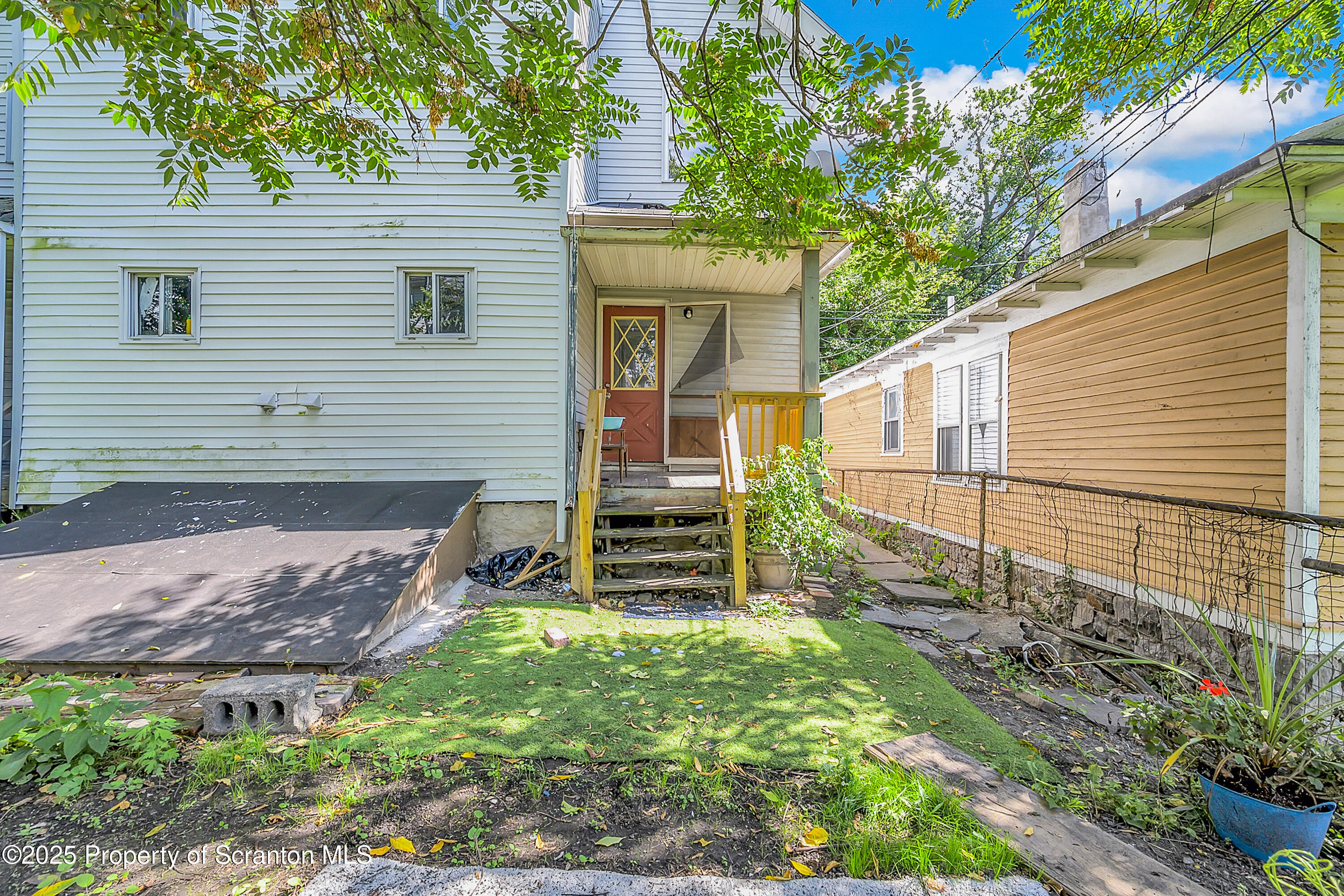 514 Stipp Court Scranton, PA 18510 - Photo 19 of 23 a view of a house with a yard