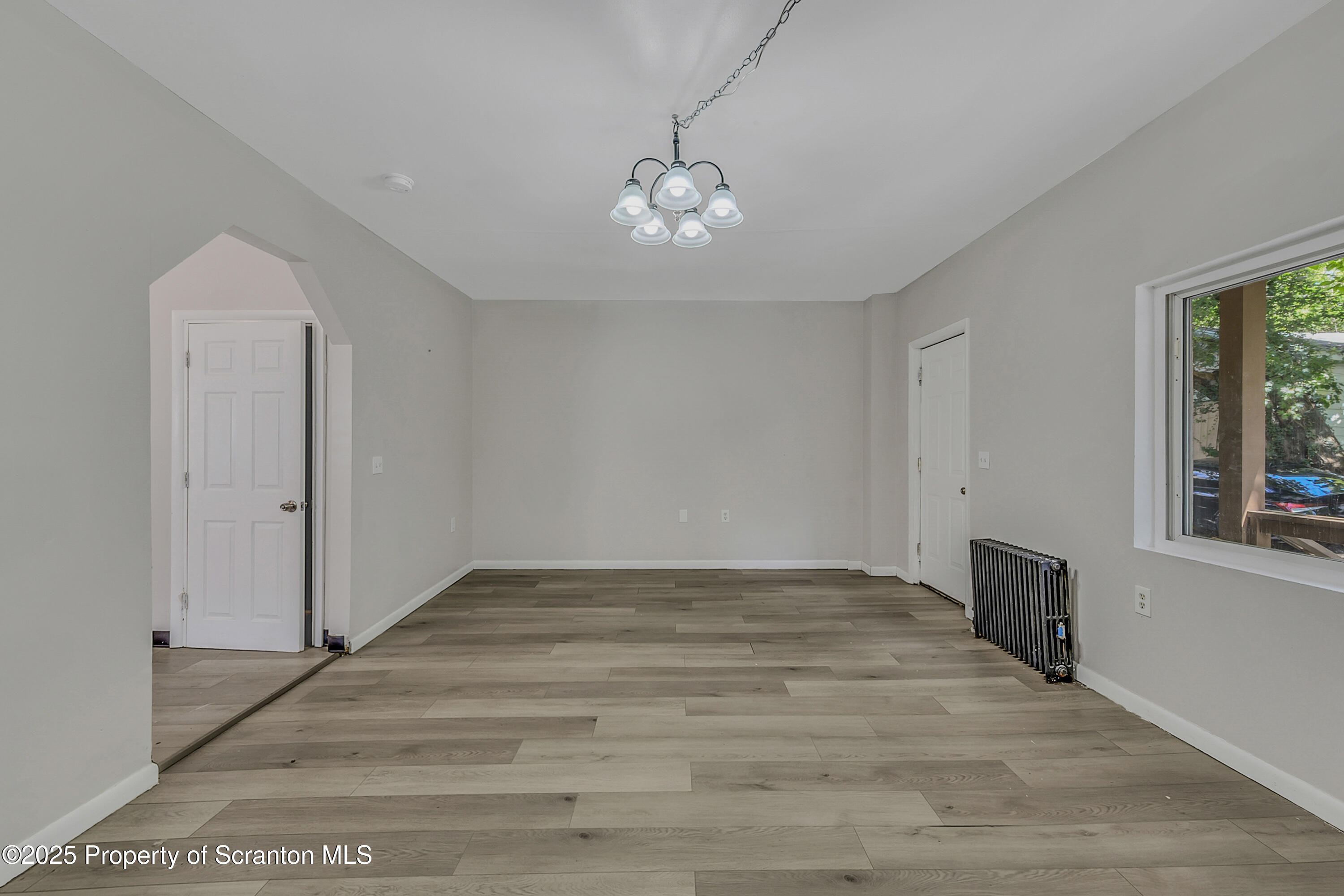 514 Stipp Court Scranton, PA 18510 - Photo 4 of 23 wooden floor in an empty room with a window