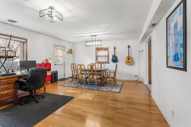 a workspace with chandelier