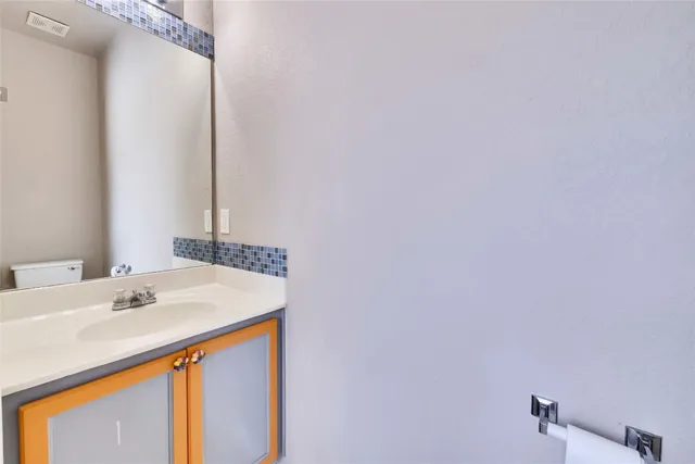 an empty room with closet area