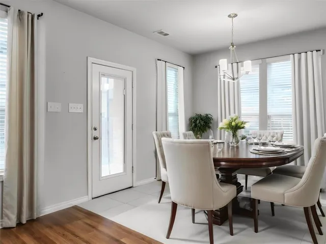 a view of kitchen with cabinets and stainless steel appliances