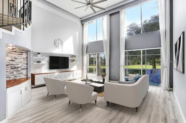 a bedroom with a large bed and a flat screen tv