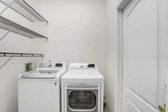 a view of a garden with a house