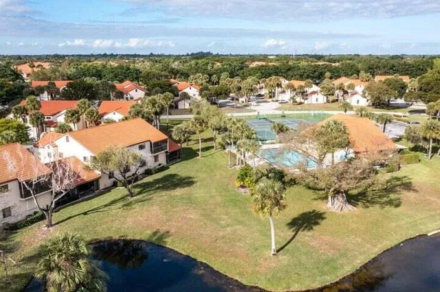 a view of a swimming pool with a patio