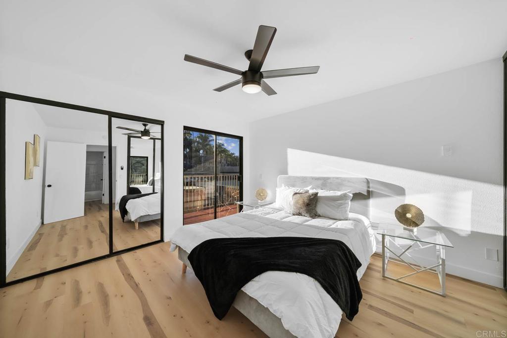 2360 Hosp Way, Unit 331 Carlsbad, CA 92008 - Photo 13 of 40 a bedroom with a bed and window