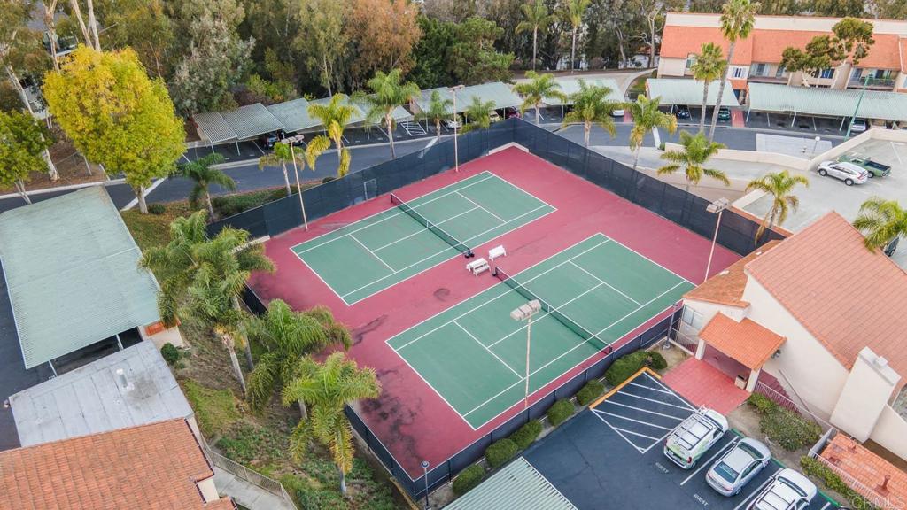 2360 Hosp Way, Unit 331 Carlsbad, CA 92008 - Photo 38 of 40 a view of a tennis ground with a table and chairs