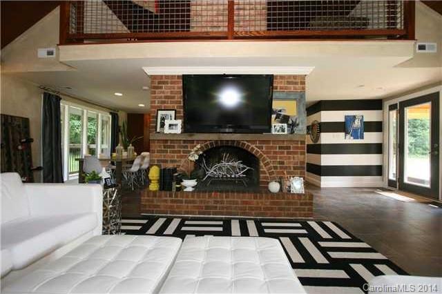6795 Alanbrook Road Charlotte, NC 28215 - Photo 4 of 11 a living room with furniture a flat screen tv and outdoor view