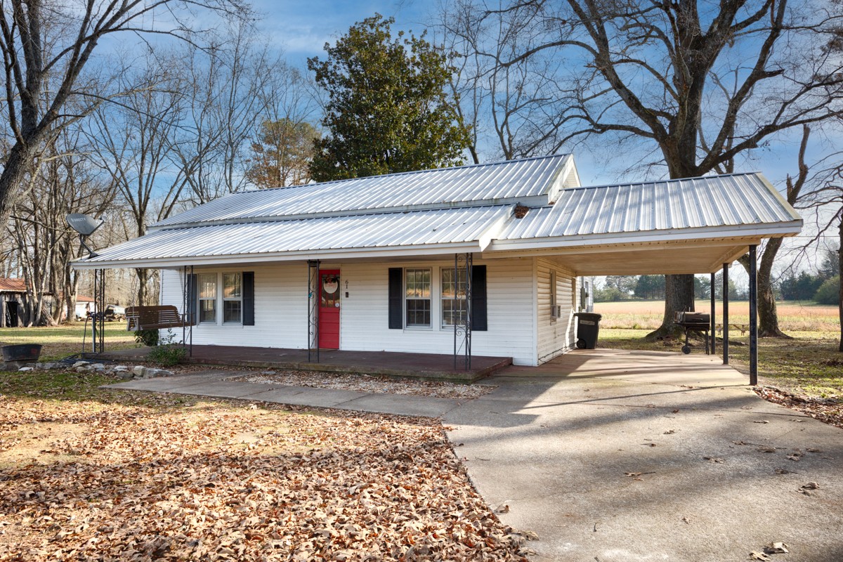 61 Minnie Brown Road Ardmore, TN 38449 - Photo 1 of 37 a view of a house with a large tree