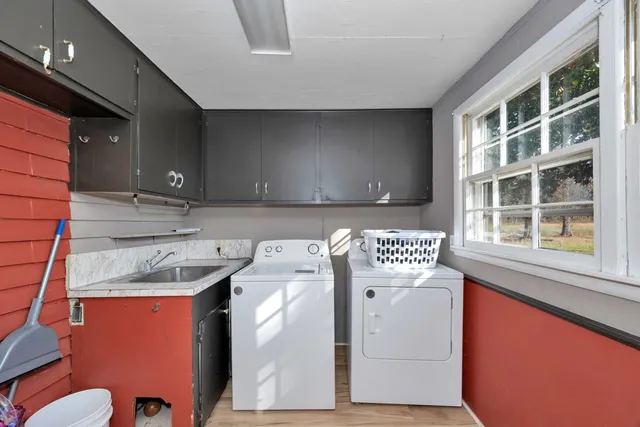 a utility room with dryer and washer