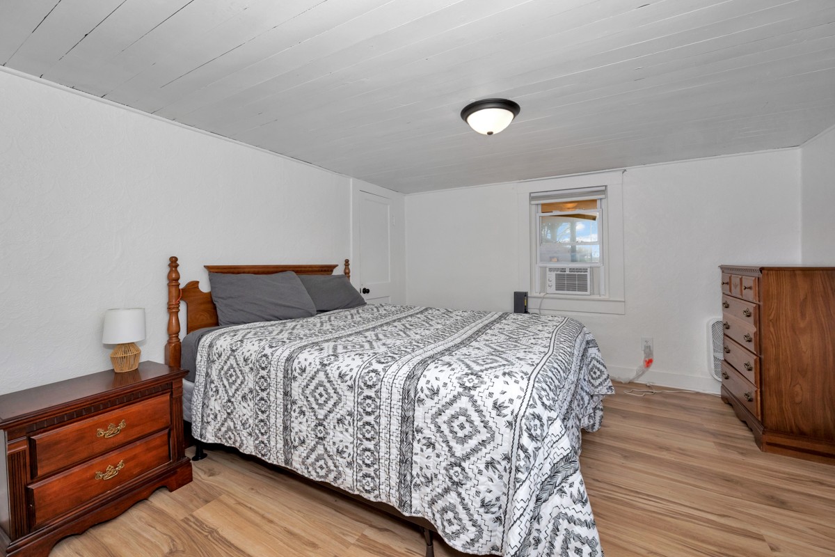 61 Minnie Brown Road Ardmore, TN 38449 - Photo 17 of 37 a bedroom with bed and wooden floor