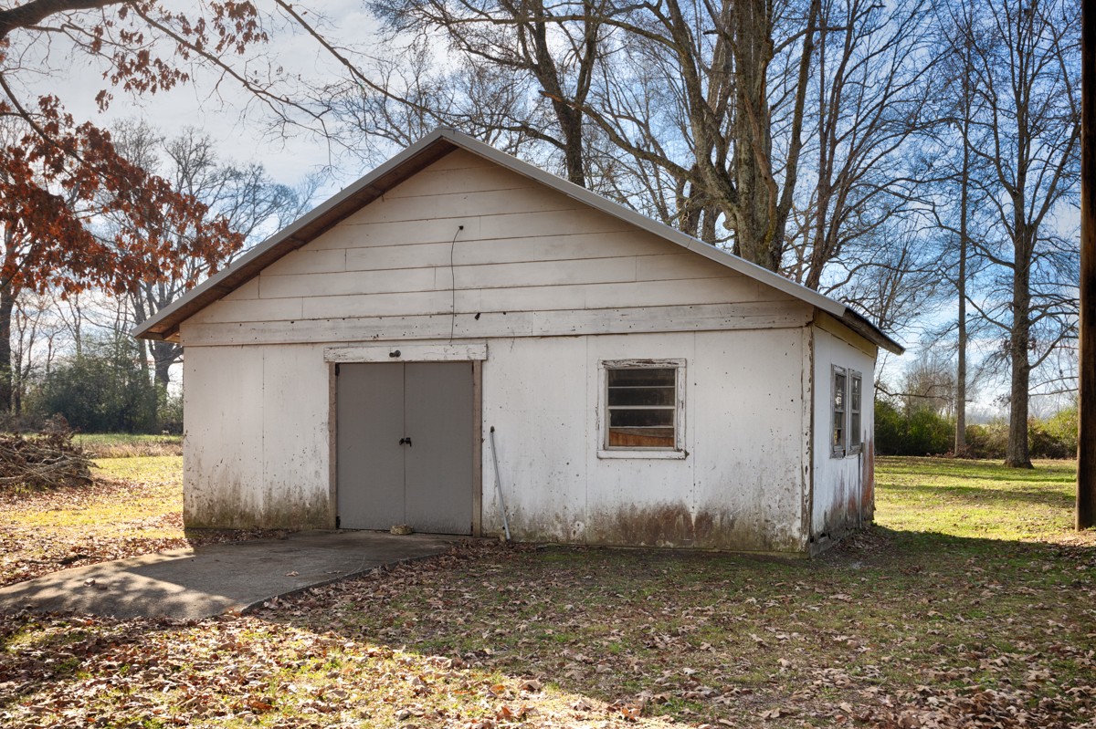 61 Minnie Brown Road Ardmore, TN 38449 - Photo 32 of 37 a view of a house with a yard