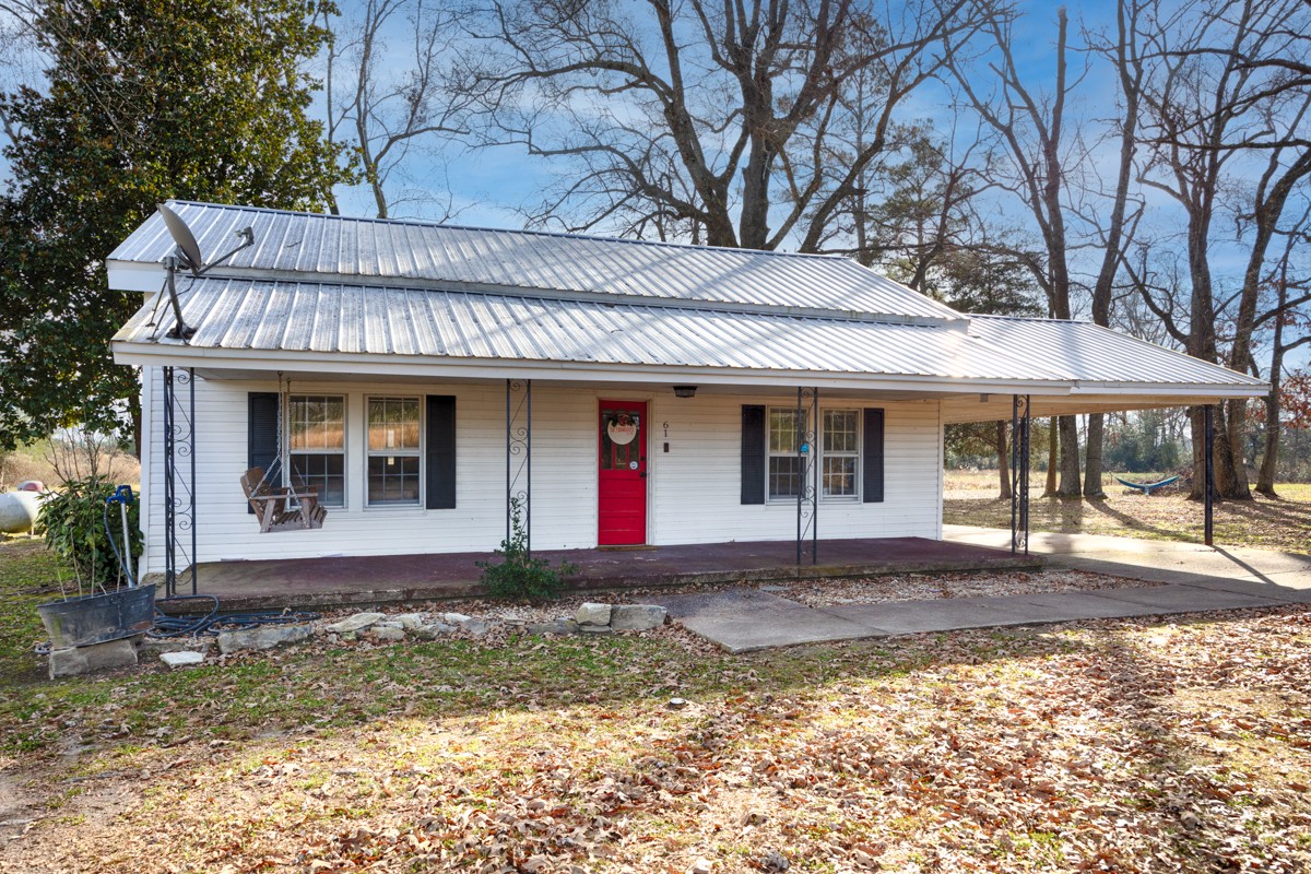 61 Minnie Brown Road Ardmore, TN 38449 - Photo 4 of 37 a front view of a house with garden