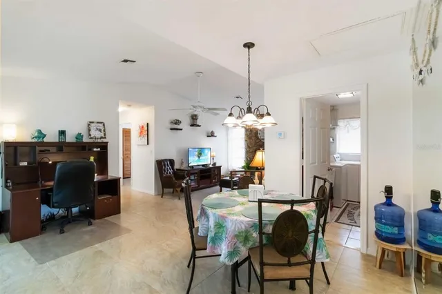 a view of a dining room with furniture