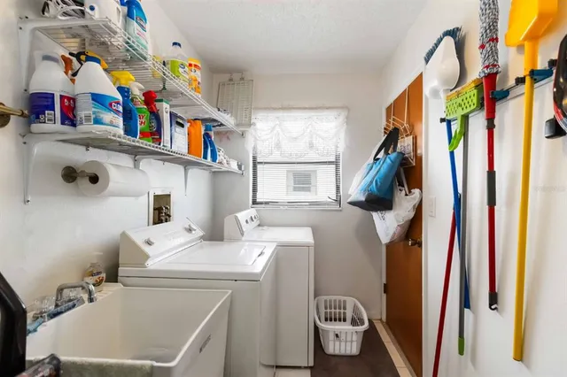 a utility room with dryer and washer