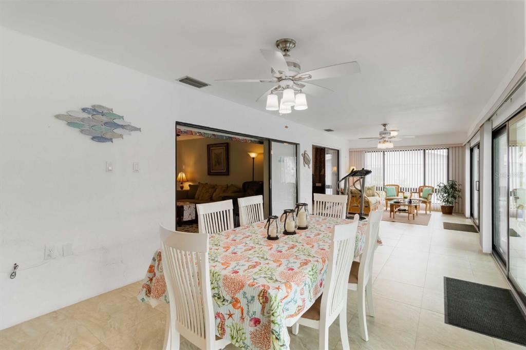 18606 Briggs Circle Port Charlotte, FL 33948 - Photo 24 of 44 a view of a dining room with furniture