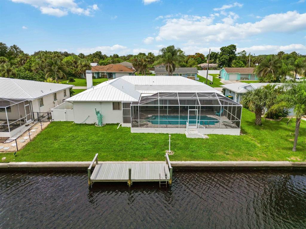 18606 Briggs Circle Port Charlotte, FL 33948 - Photo 35 of 44 a view of a house with a backyard