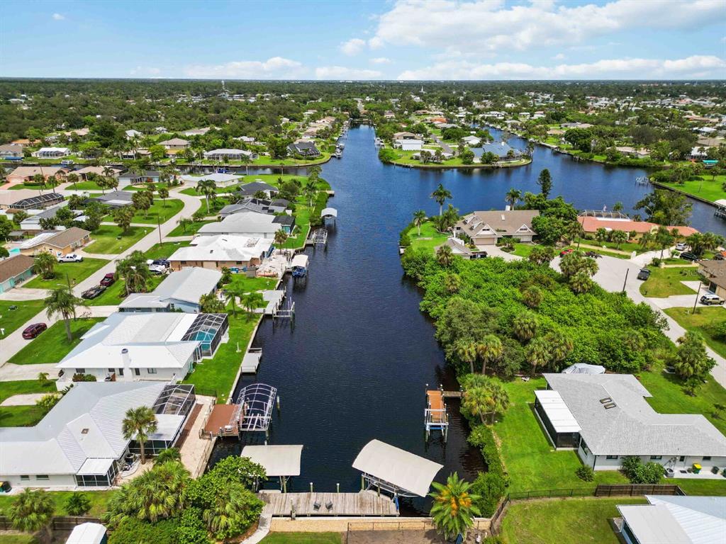 18606 Briggs Circle Port Charlotte, FL 33948 - Photo 37 of 44 an aerial view of residential houses with outdoor space