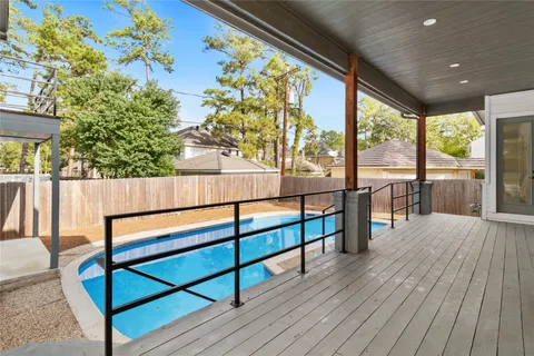 a view of two chairs in the balcony