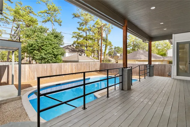 a view of two chairs in the balcony