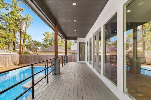a view of two chairs in the balcony