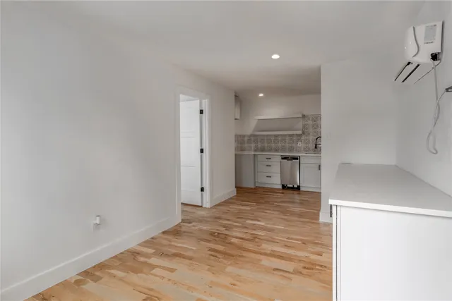 a view of a kitchen with a sink