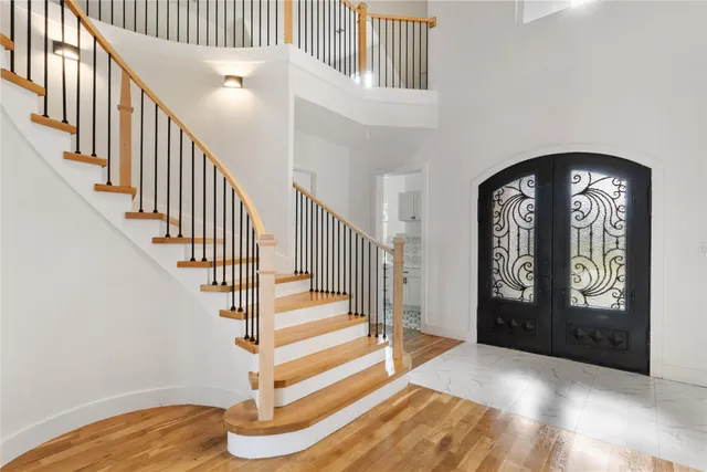 a view of an entryway with a staircase