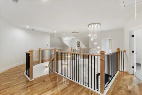 a view of a hallway view with staircase