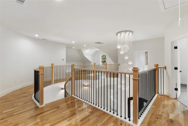 a view of a hallway view with staircase