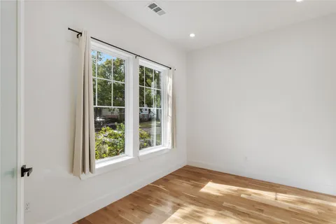 a view of an empty room and window