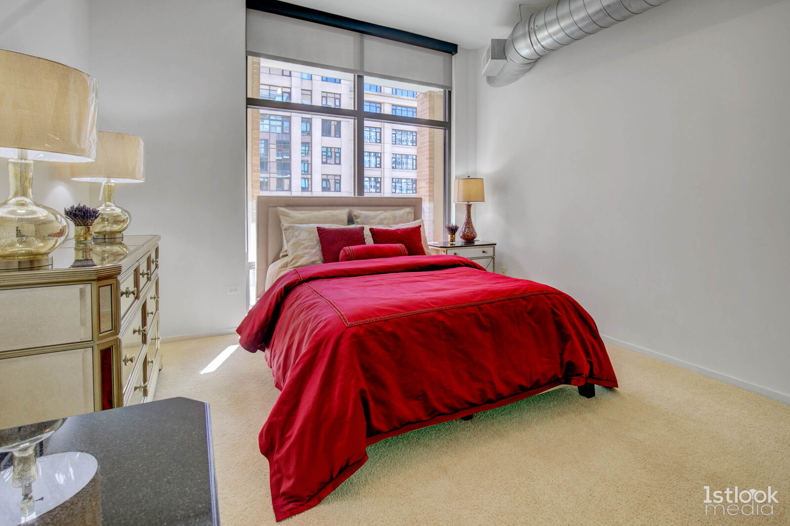 520 South State Street, Unit 1103 Chicago, IL 60605 - Photo 17 of 43 a bed sitting in a bedroom next to a window