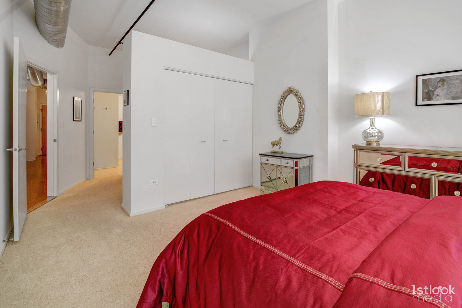 520 South State Street, Unit 1103 Chicago, IL 60605 - Photo 19 of 43 a bedroom with a bed and cabinets