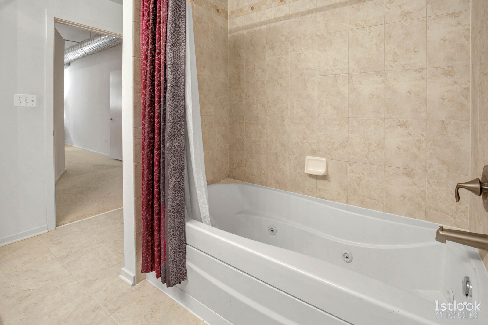 520 South State Street, Unit 1103 Chicago, IL 60605 - Photo 20 of 43 a bathroom with a bathtub and a shower