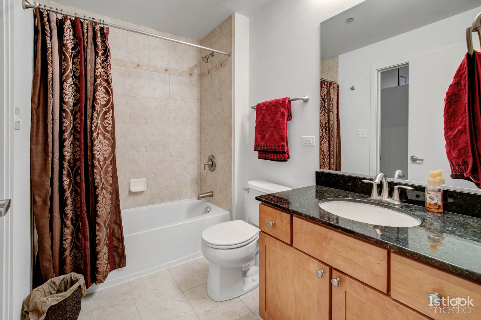 520 South State Street, Unit 1103 Chicago, IL 60605 - Photo 21 of 43 a bathroom with a granite countertop sink toilet and shower