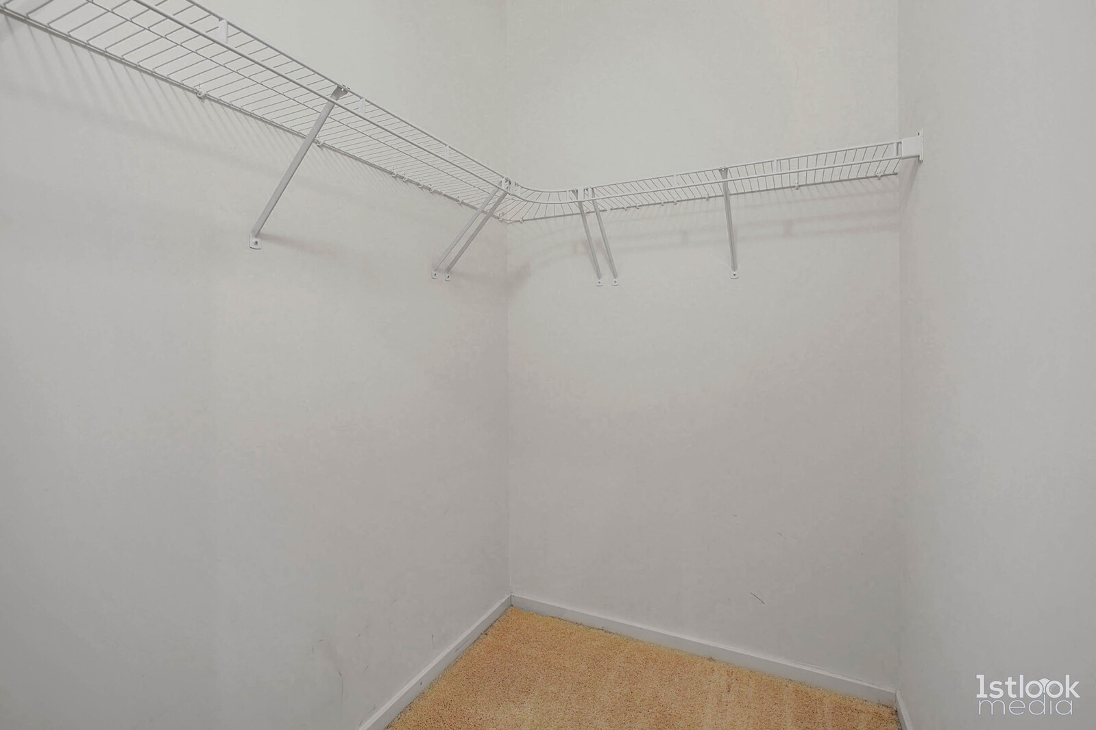 520 South State Street, Unit 1103 Chicago, IL 60605 - Photo 23 of 43 a view of a room with racks on the wall