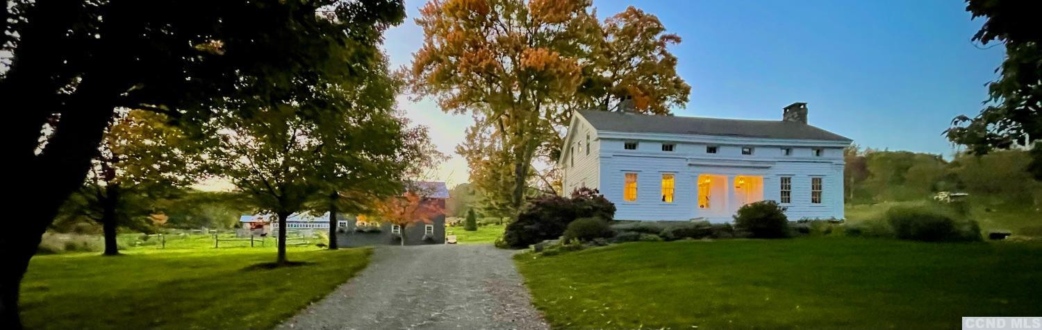 739 Center Hill Road Copake, NY 12516 - Photo 1 of 28 a front view of a house with garden