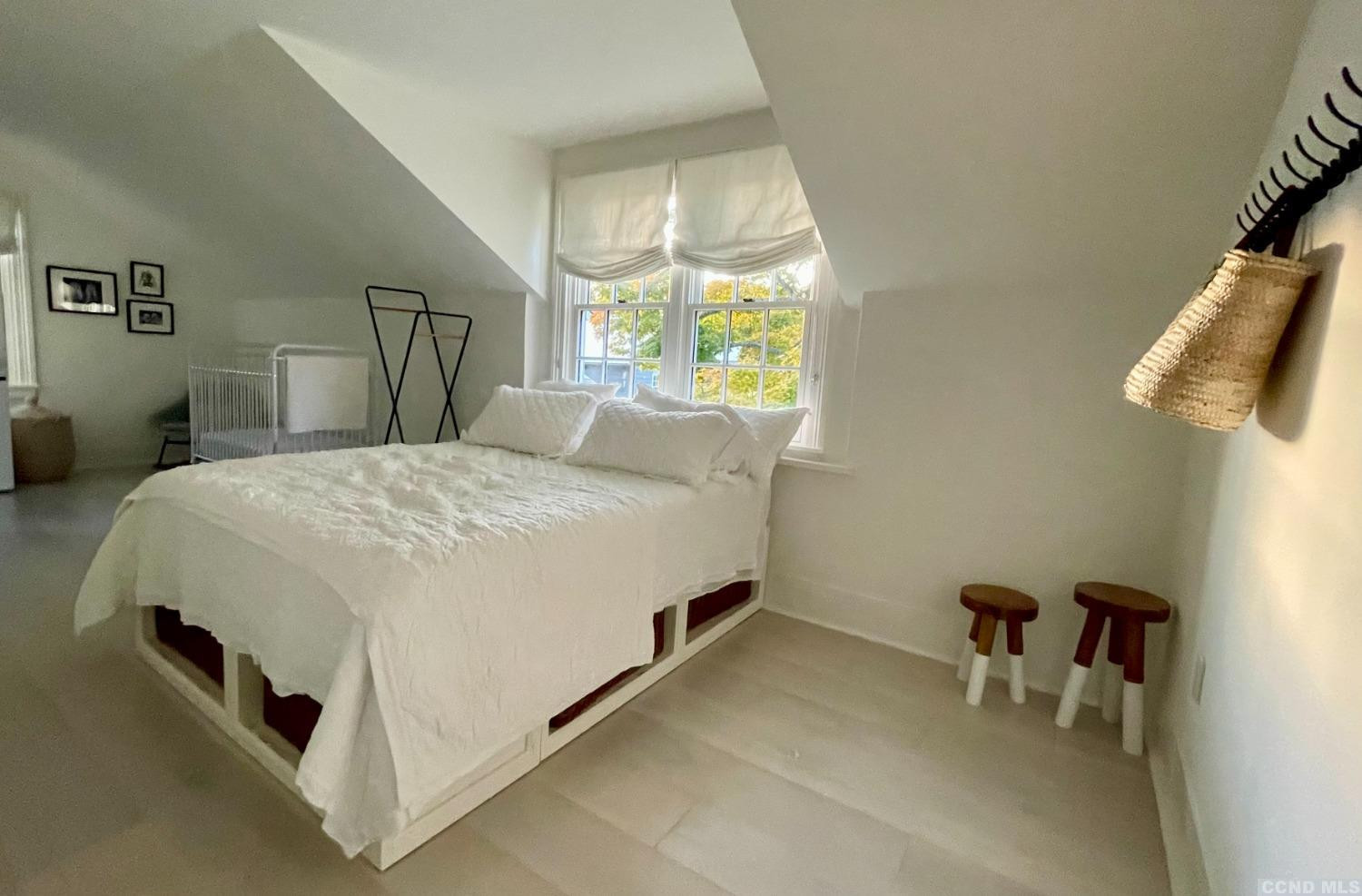 739 Center Hill Road Copake, NY 12516 - Photo 20 of 28 a bed room with a bed and a chair