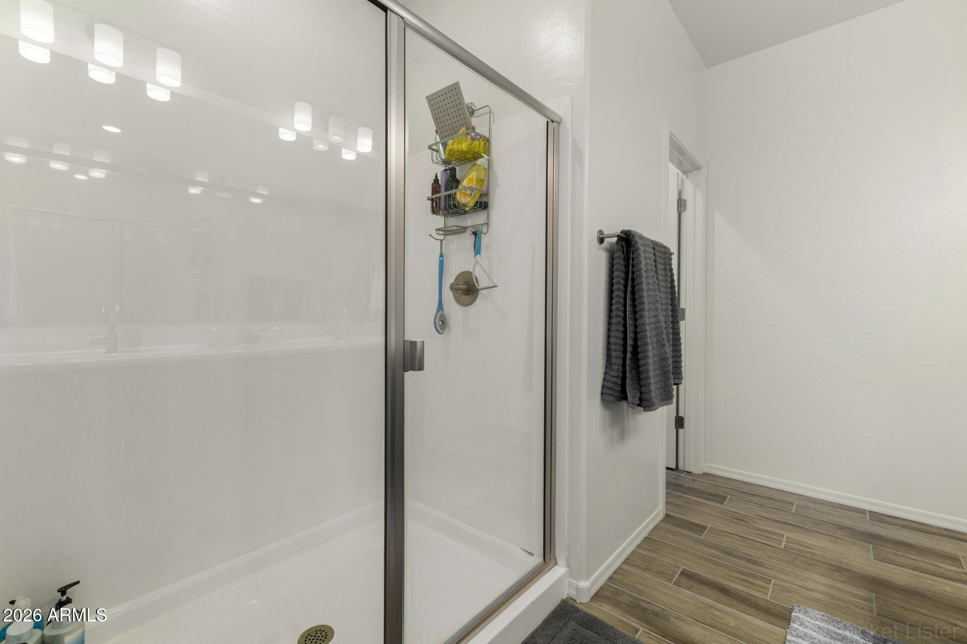 1917 East Hampton Lane, Unit 104 Gilbert, AZ 85295 - Photo 15 of 39 a bathroom with a shower and mirror